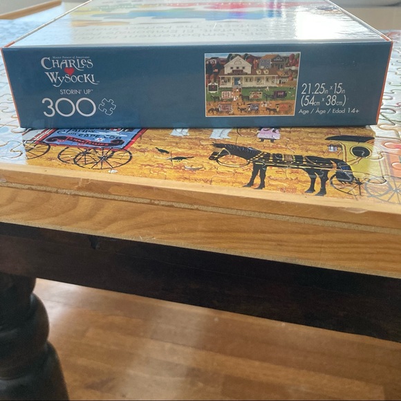 Like New!  Buffalo Games 300 Piece Puzzle: Charles Wysoki’s Storin’ Up - Picture 4 of 5